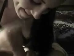 A black-haired amateur floozy was occupied with blowing a tasty lollicock.